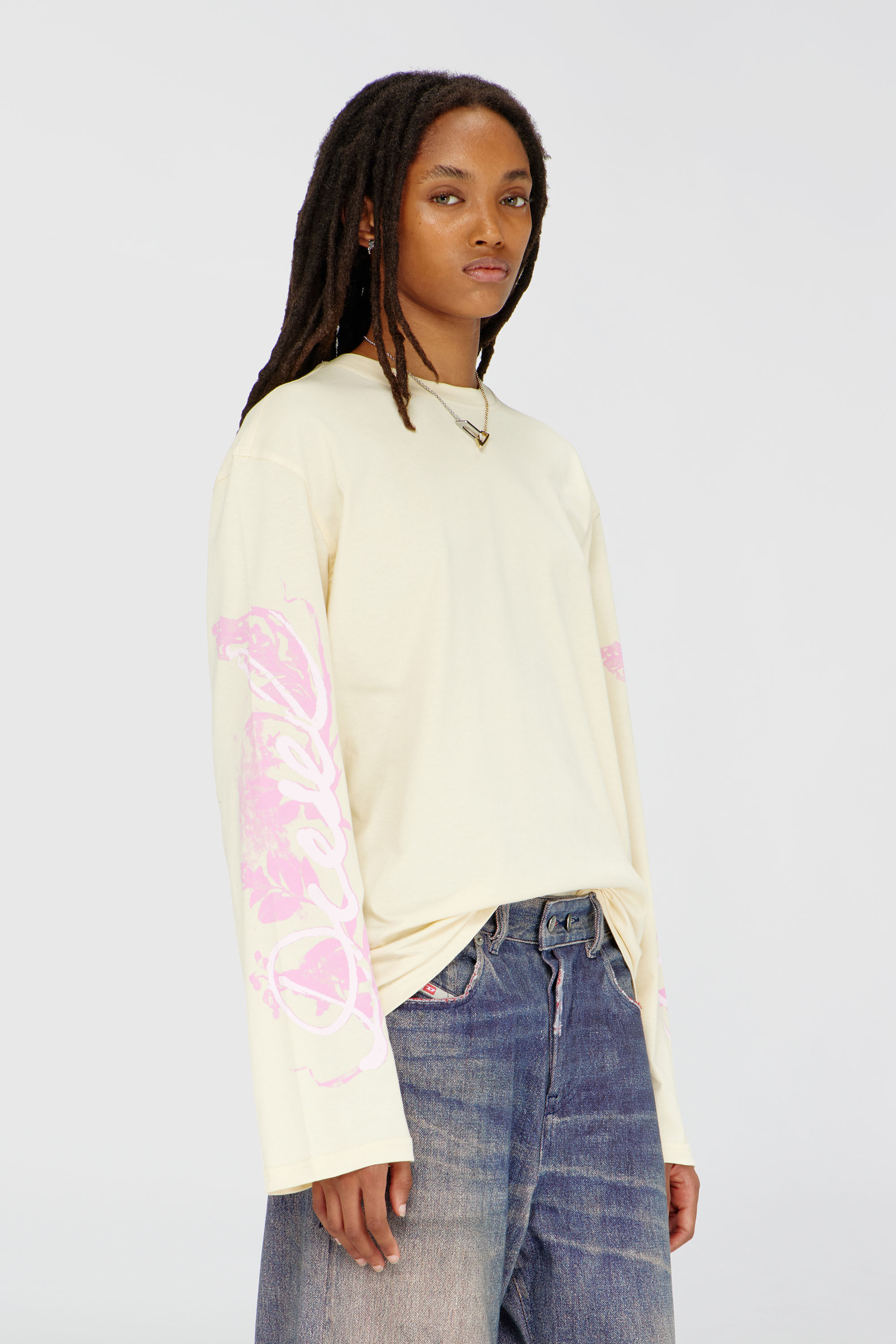 Diesel - T-HILARY-LS-AA3, Woman's Long-sleeve T-shirt with graphic prints and crystals in Yellow - 3