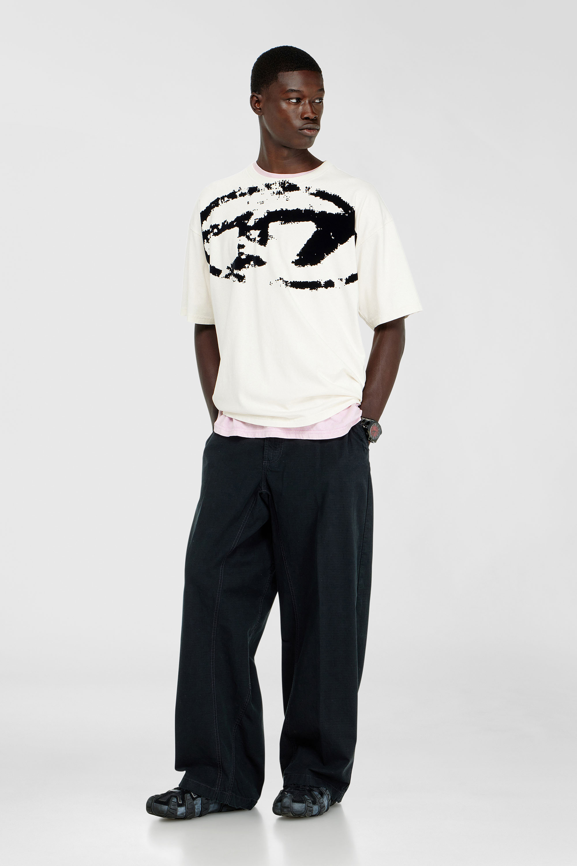 T-shirt with distressed flocked logo