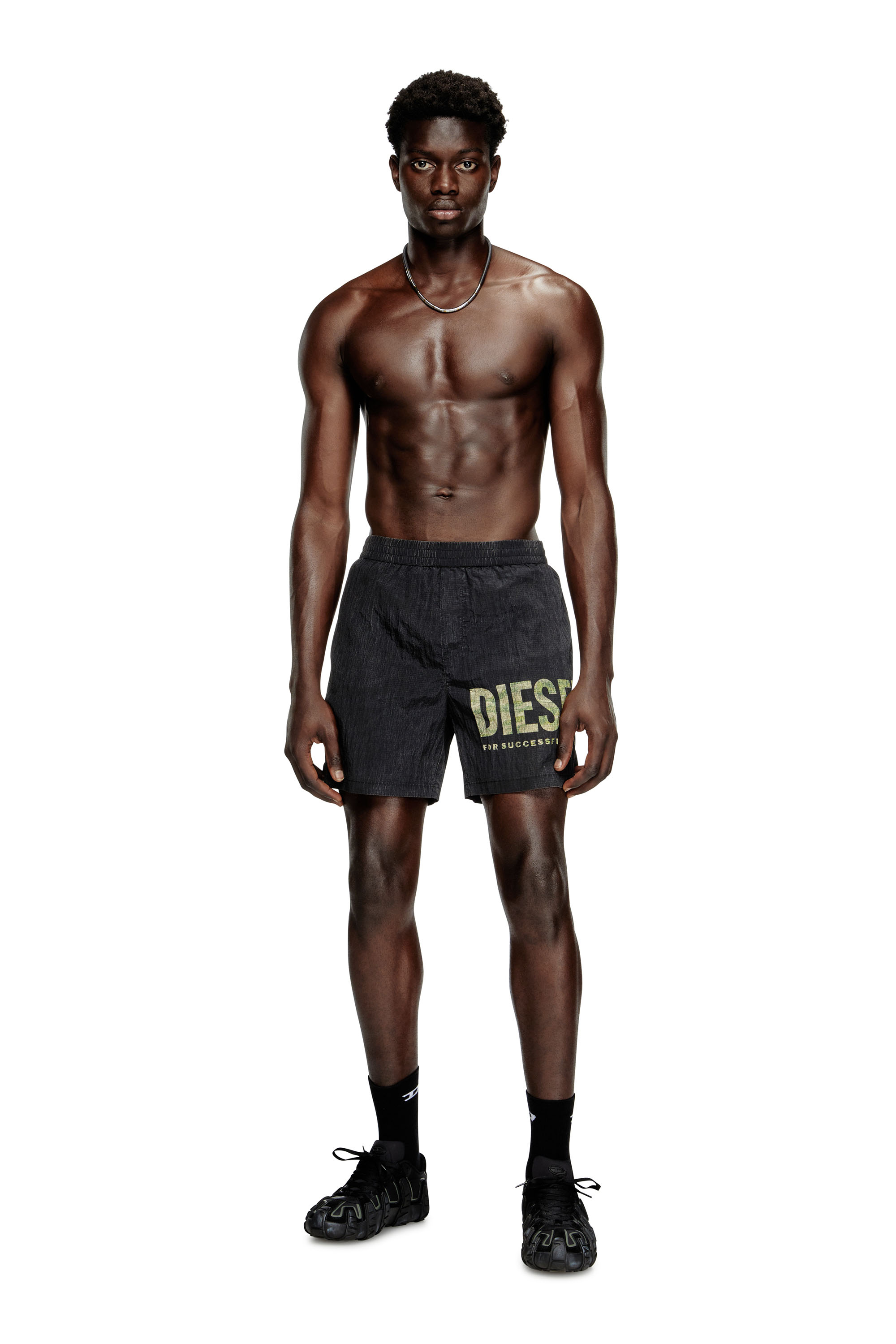 Diesel - RIO-41-UTLT, Man's Mid-length swim shorts in camo ripstop in Black/Green - 1