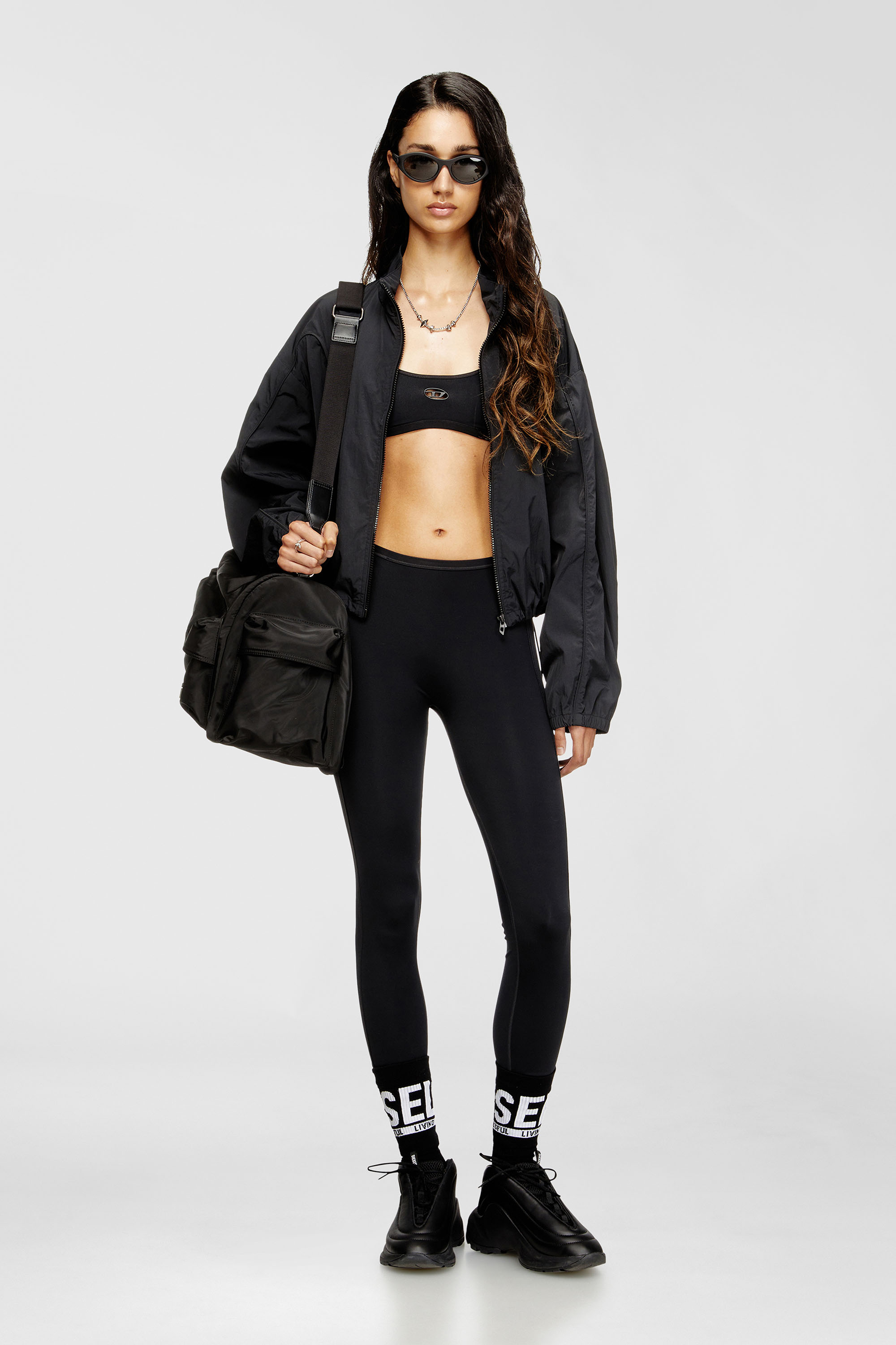 Diesel - CHELSEA-UTLT, Woman's Sports bra with cut-out logo in Black - 6